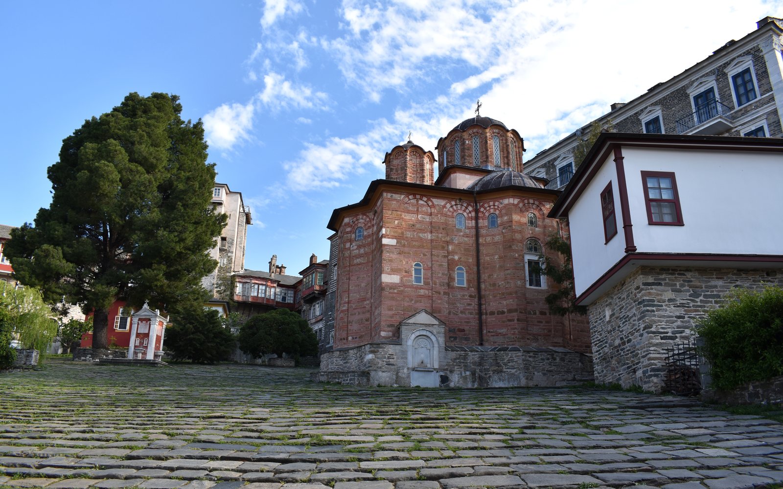 The cobbled courtyard and katholikon of Vatopedi Monastery on Mount Athos